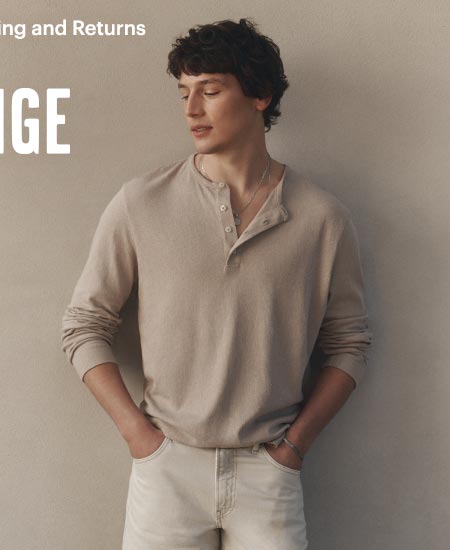 A man wearing a beige linen henley.