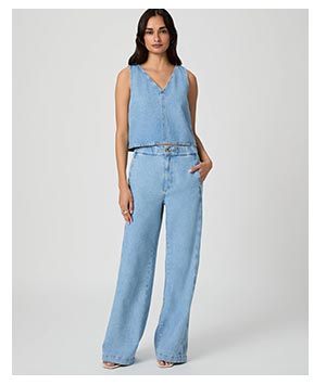 Image of a woman wearing a blue denim tank and matching wide leg jeans.