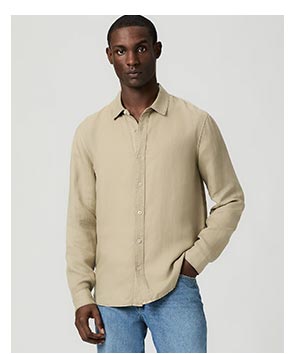 Image of a man wearing a long sleeve button up shirt in lemongrass.