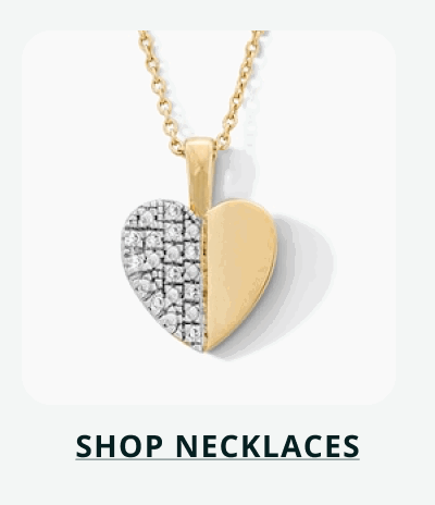 Two-tone heart-shaped pendant, both with gold & diamonds. Click here to shop necklaces