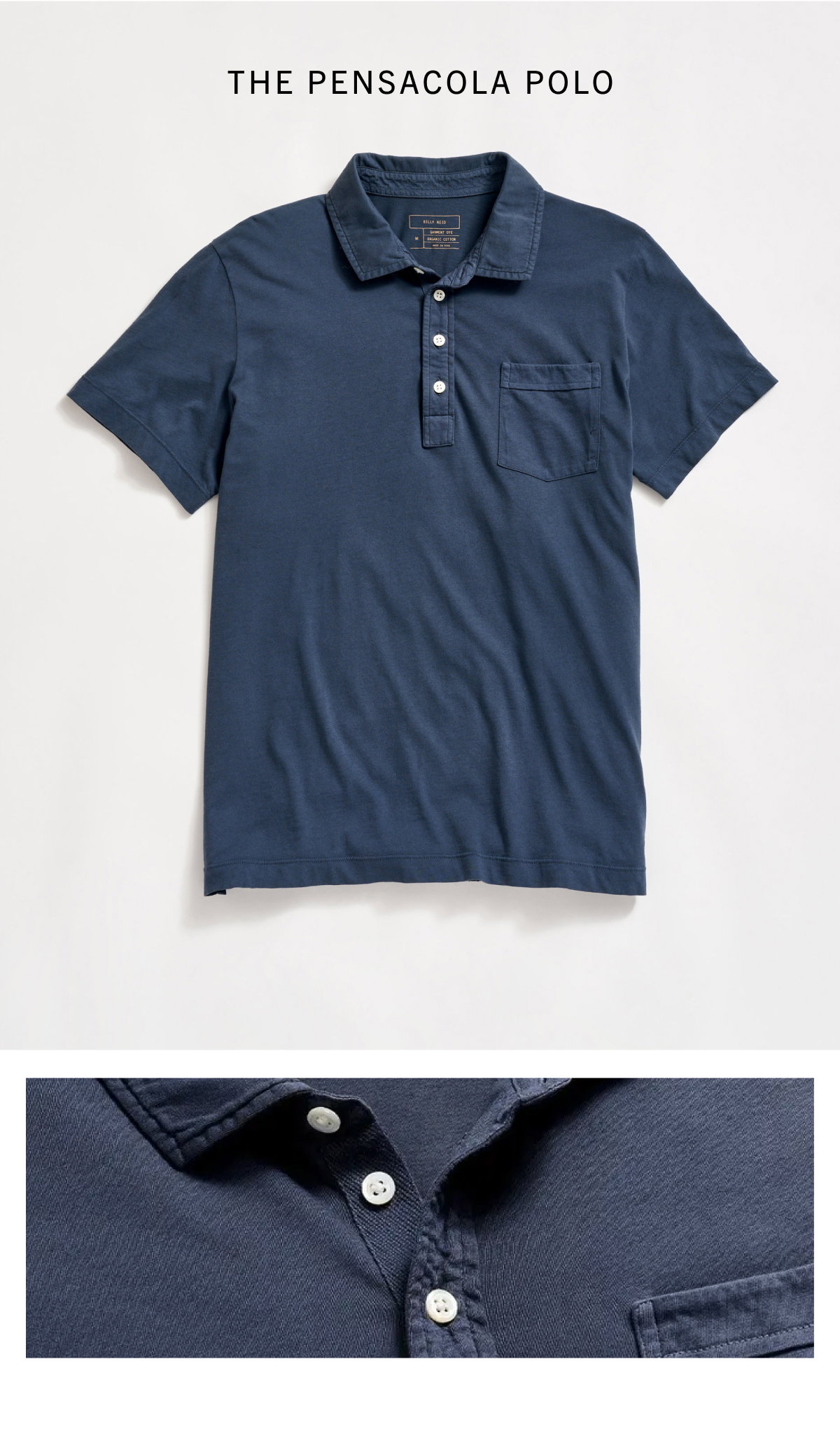 Navy polo on a grey background
