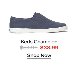 A side view of the Keds Champion Twill Round Toe Slip-On in navy. The style was $54.95 and is on sale for $38.99.  Shop Now