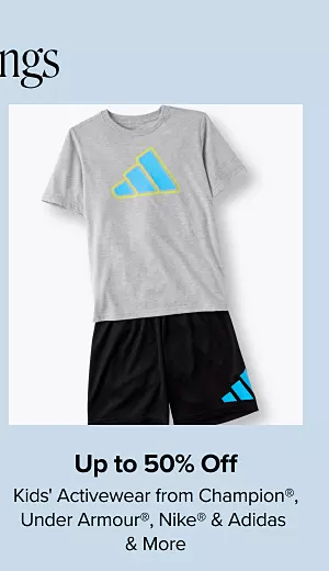 Up to 50% off kids activewear from Champion, Under Armour, Nike and Adidas. Shop now. A kids tee shirt with black shorts.