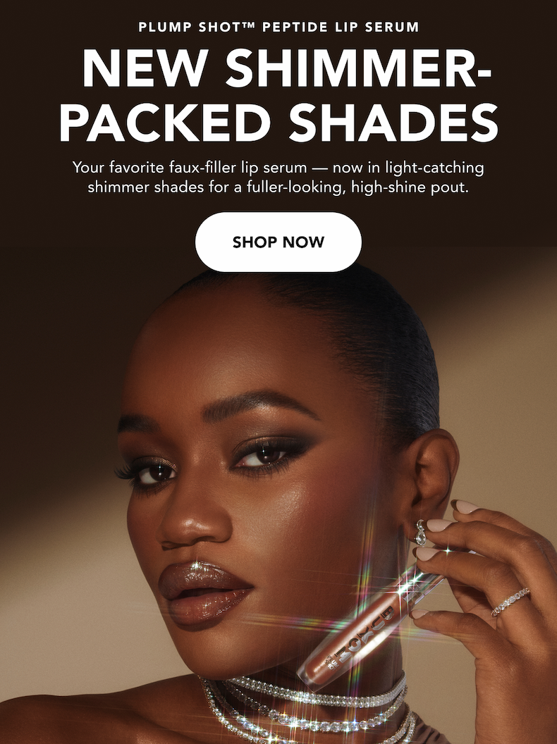 Model holding Plump Shot™ Peptide Lip Serum