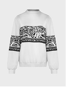 Long sleeve knit with black and white abstract design
