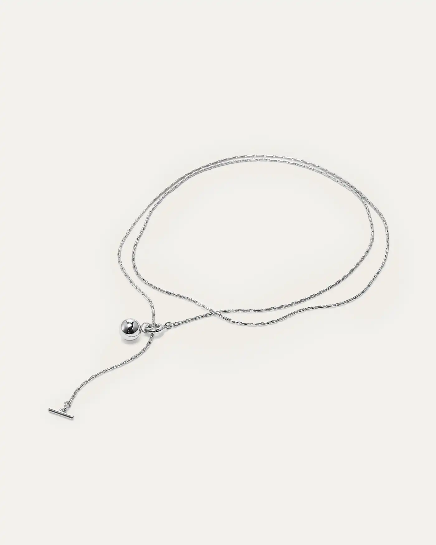 An intricate round chain with unique light-catching qualities and limitless ways to wear. This piece can be worn fully extended, double wrapped, as a ...