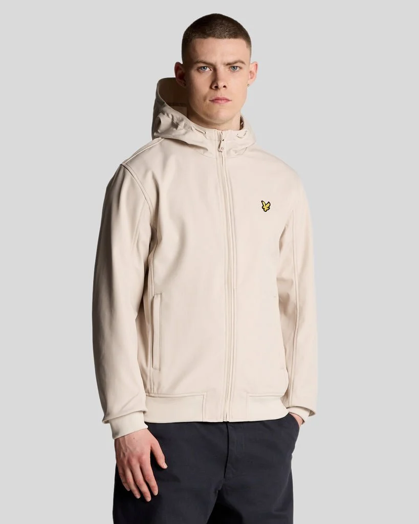 Man wears Fleece Lined Softshell Jacket in Dark Navy