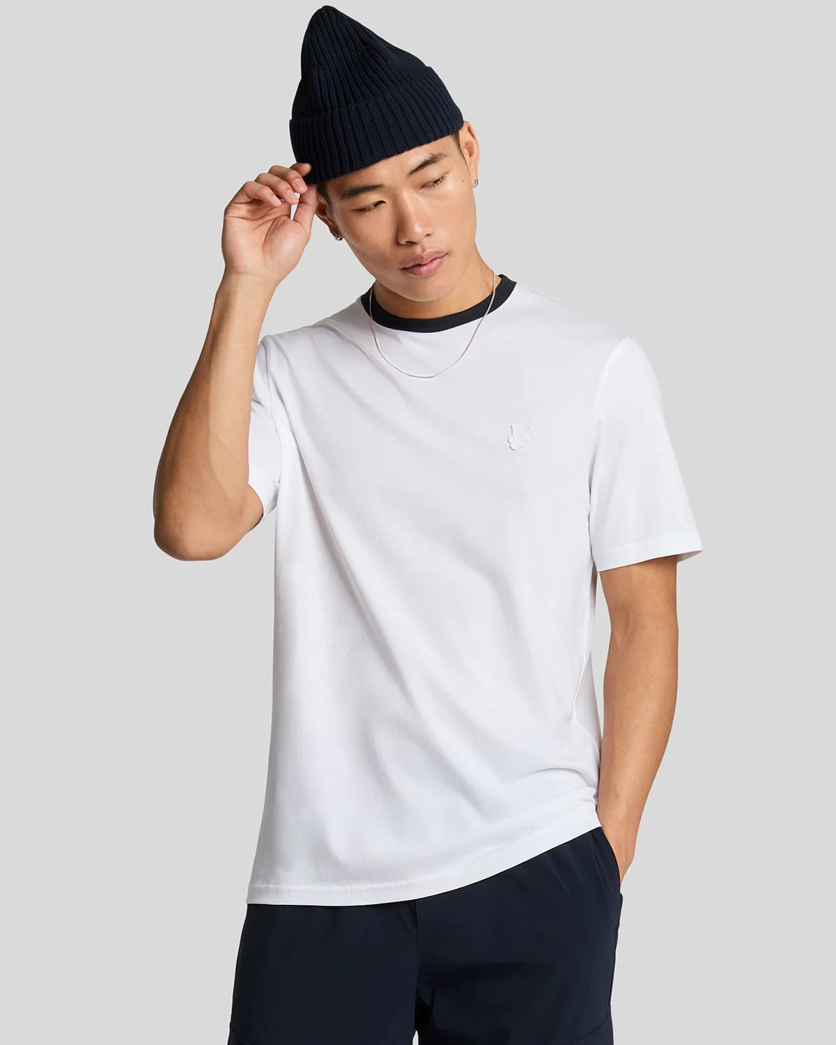 Man wears Superfine Cotton Contrast T-Shirt in White & Dark Navy
