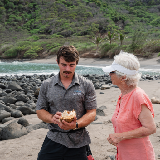 Guide on the beach with a guest