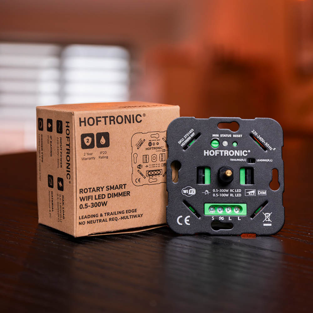 300 W LED Wi-Fi dimmer on a table, with the packaging next to it