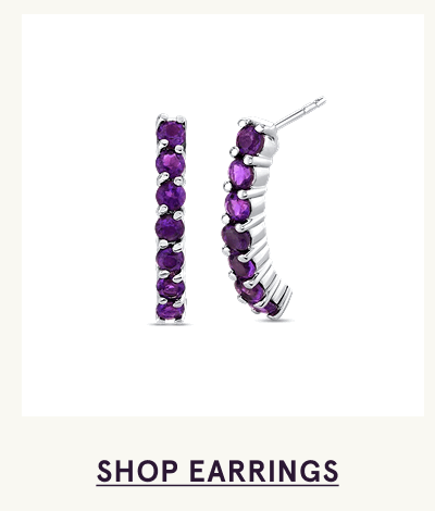 Silver ear climbers set with a vertical row of purple amethyst gemstones. Click here to shop earrings