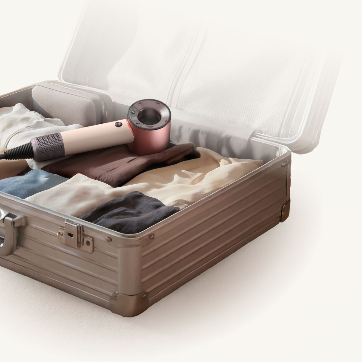 Dyson Supersonic Travel hair dryer in a suitcase.