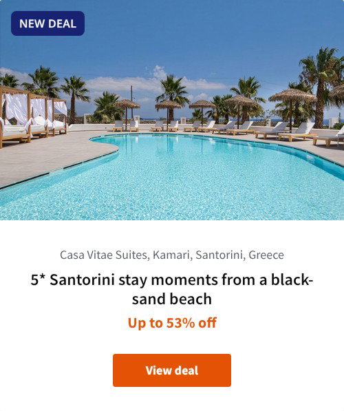 5* Santorini stay moments from a black-sand beach