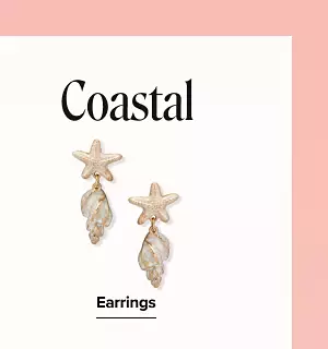 Coastal. Shop earrings. Pair of starfish earrings. 