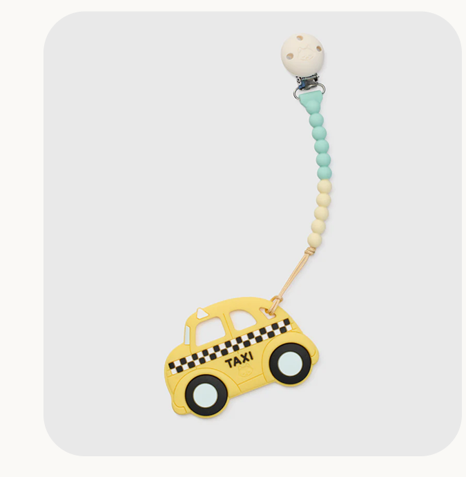 yellow taxi on a blue and yellow silicone pacifier clip
