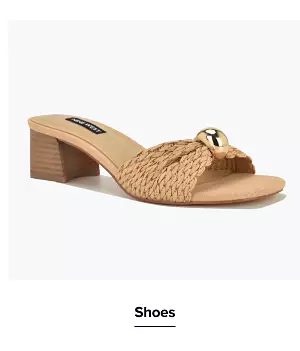Shop shoes. A wedged heeled sandal.
