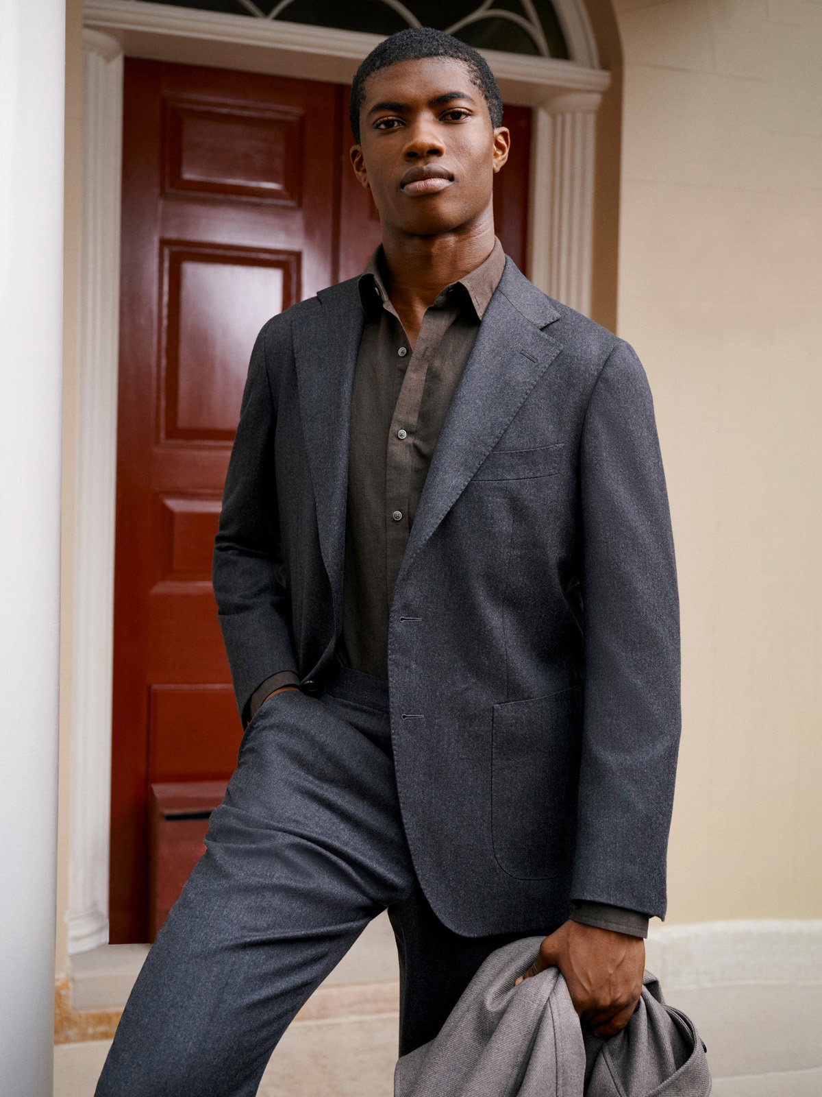 MJ Bale charcoal flannel suit with matching grey shirt and overcoat