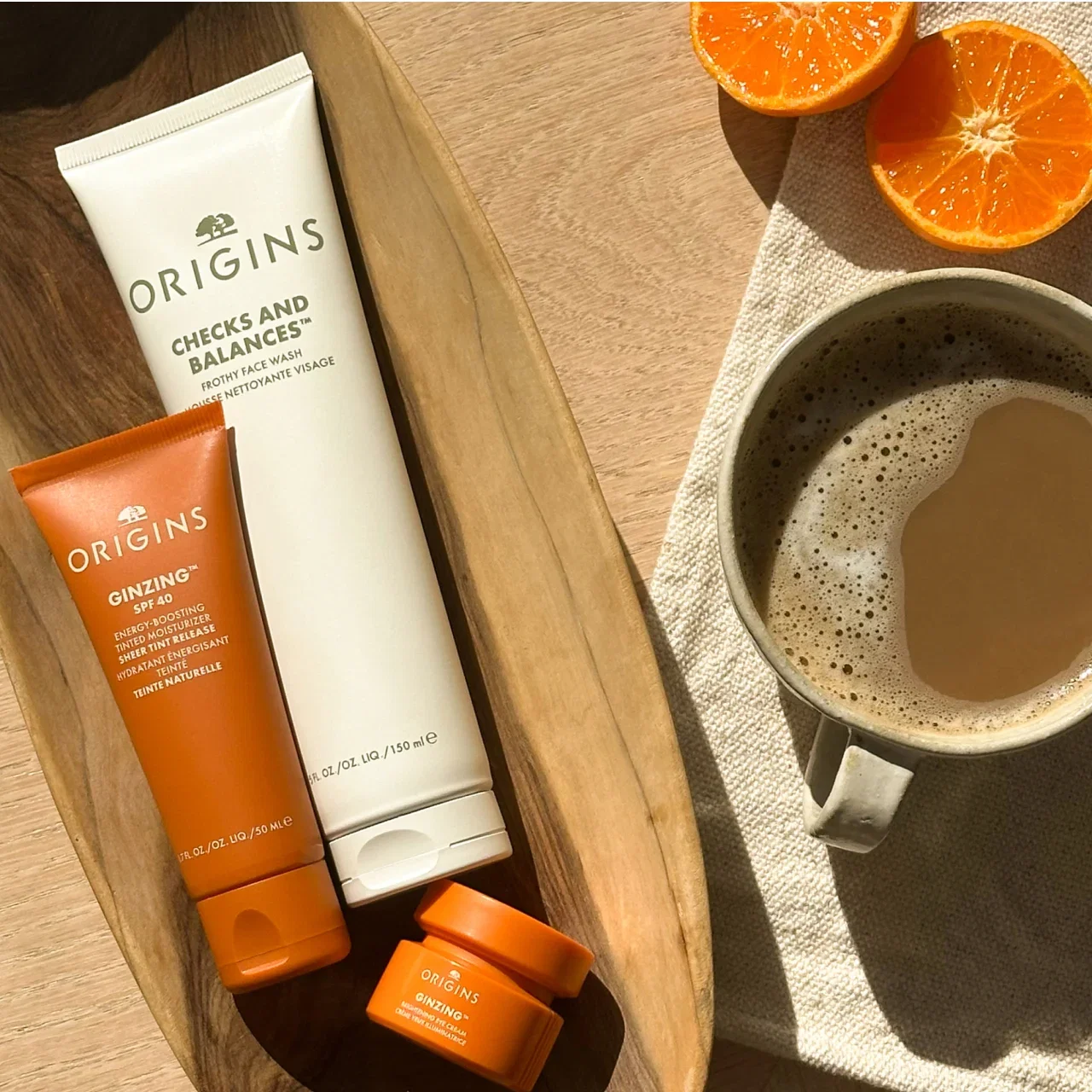ORIGINS | CHECKS AND BALANCES™ | FROTHY FACE WASH MOUSSE NETTOYANTE VISAGE | ORIGINS | GINZING™ SPF 40 ENERGY-BOOSTING TINTED MOISTURIZER SHEER TINT RELEASE | HYDRATANT ENERGISANT TEINTE | TIENTE NATURELLE | ORIGINS | GINZING™ BRIGHTENING EYE CREAM CRÈME YEUX ILLUMINATRICE
