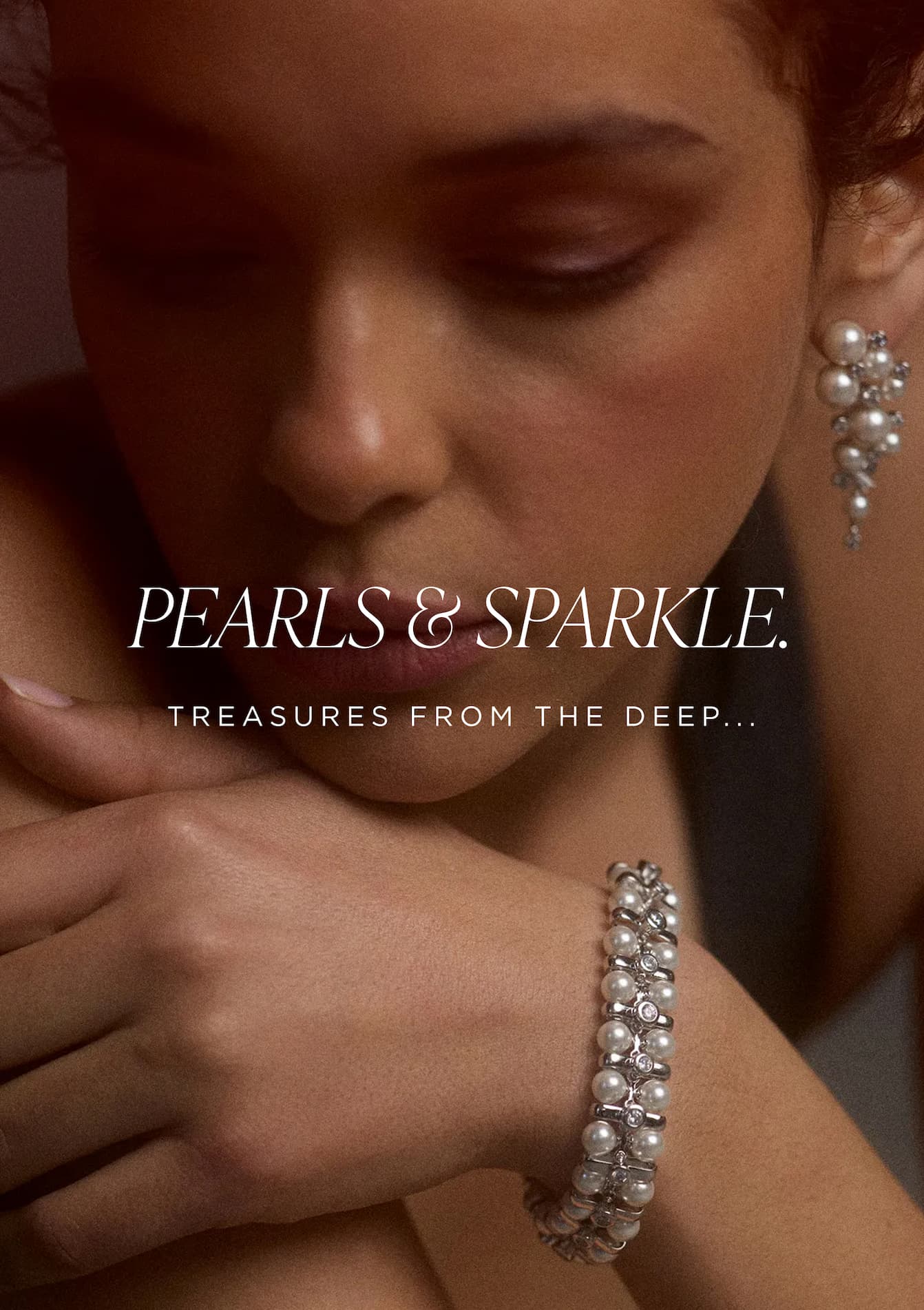 model wearing pieces from Under the Sea collection featuring pearls and CZs