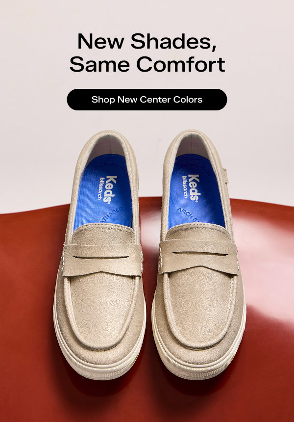An overhead view of the Center III Metallic Suede Loafers in champagne set on a brown surface. The email says New Shades, Same Comfort. Shop New Center Colors
