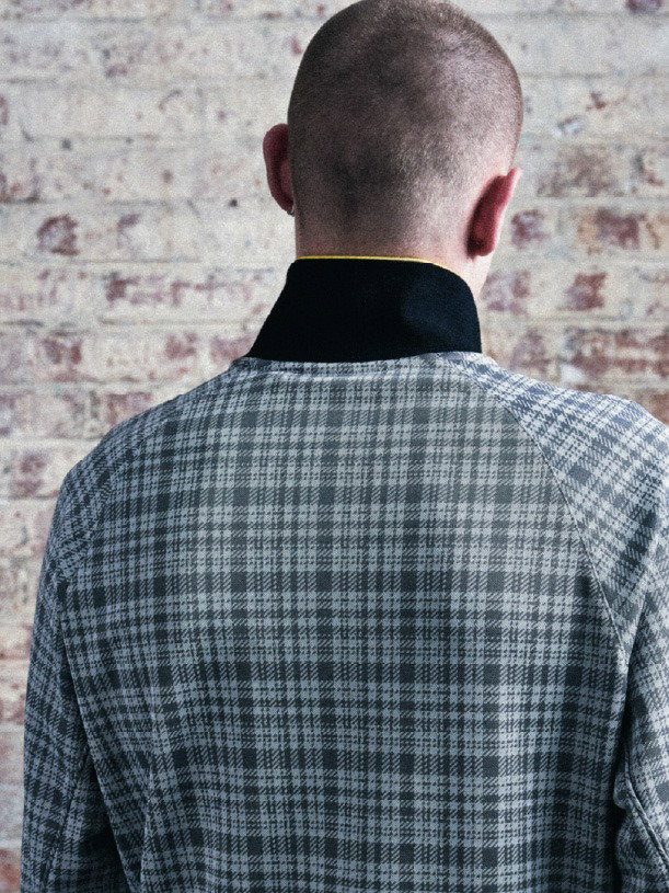 Model wears Hawick Cotton Check Track Jacket in Mid Grey Marl