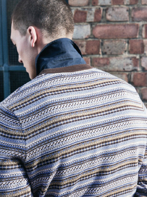 Model wears Fair Isle Crew Neck Jumper in Ebony