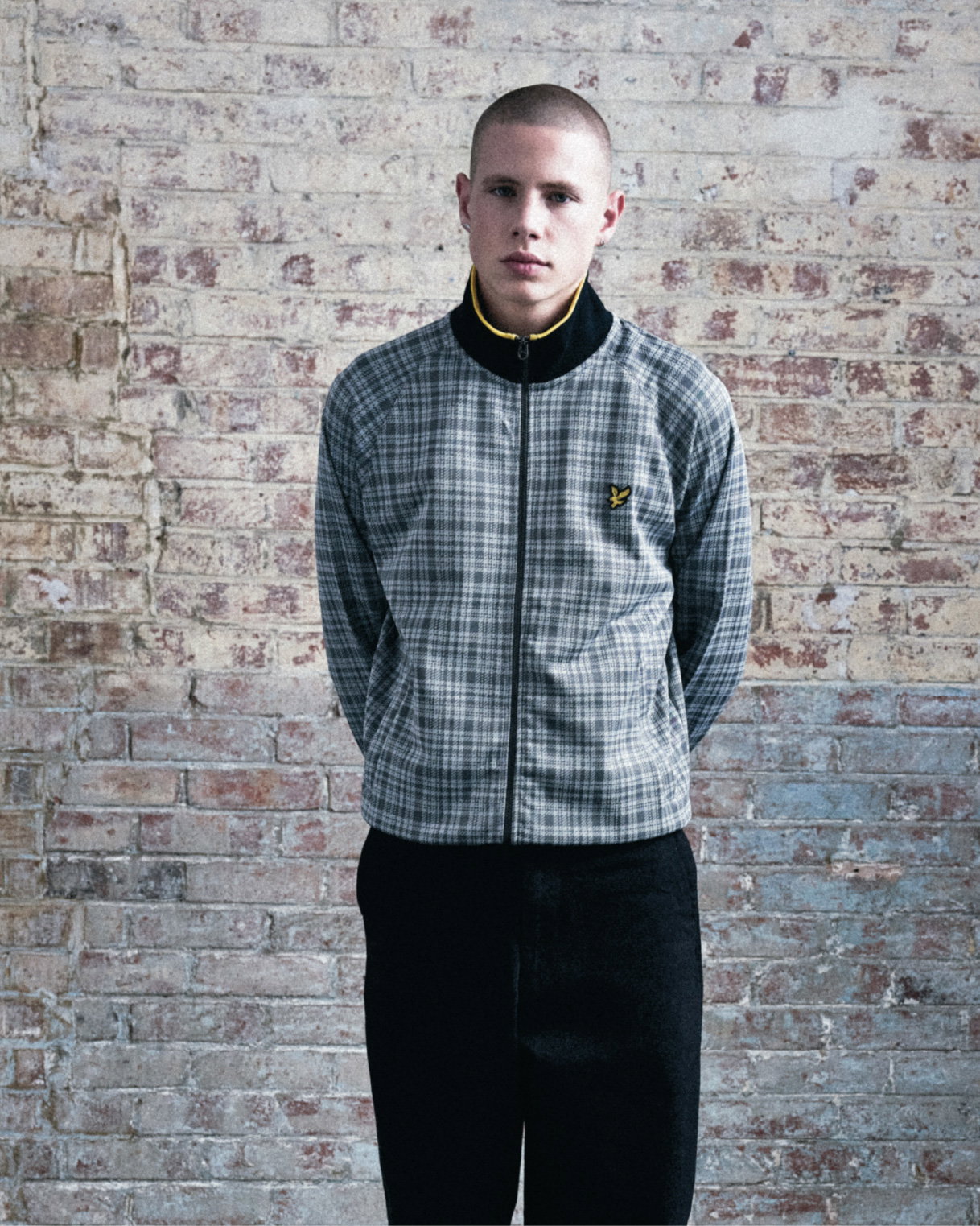 Model wears Hawick Cotton Check Track Jacket in Mid Grey Marl