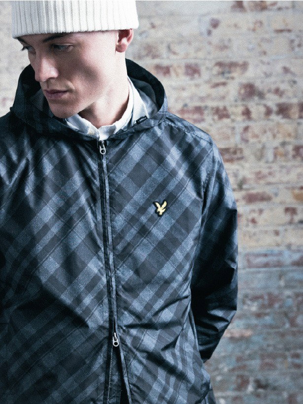 Model wears Tartan Lightweight Hooded Jacket in Jet Black