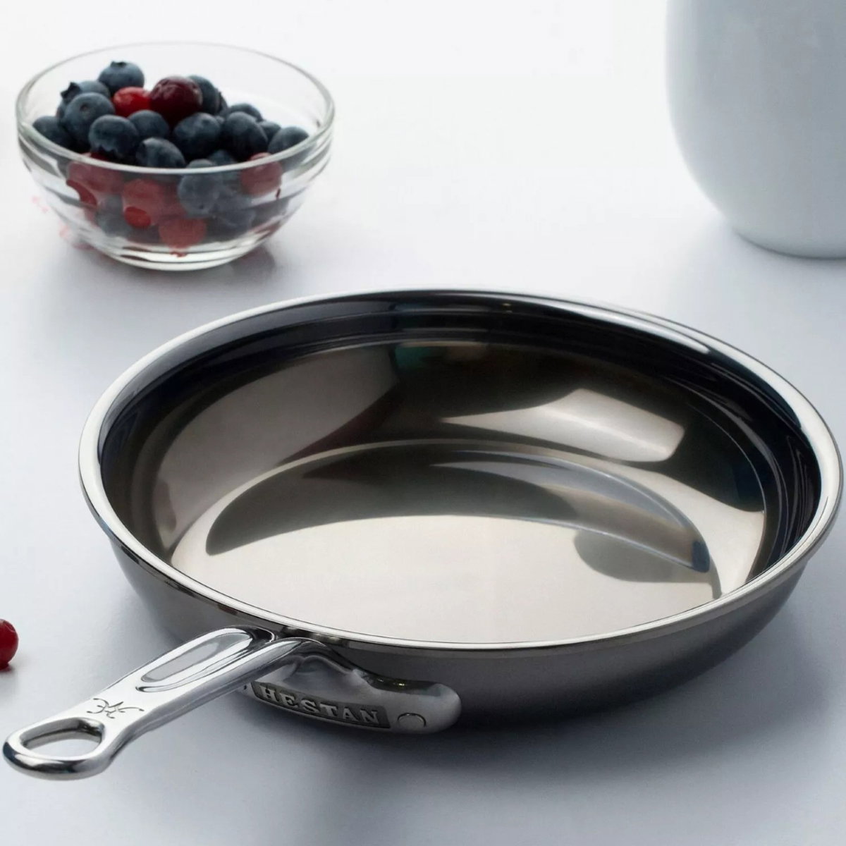 IMG: NanoBond skillet on table with berries in the background