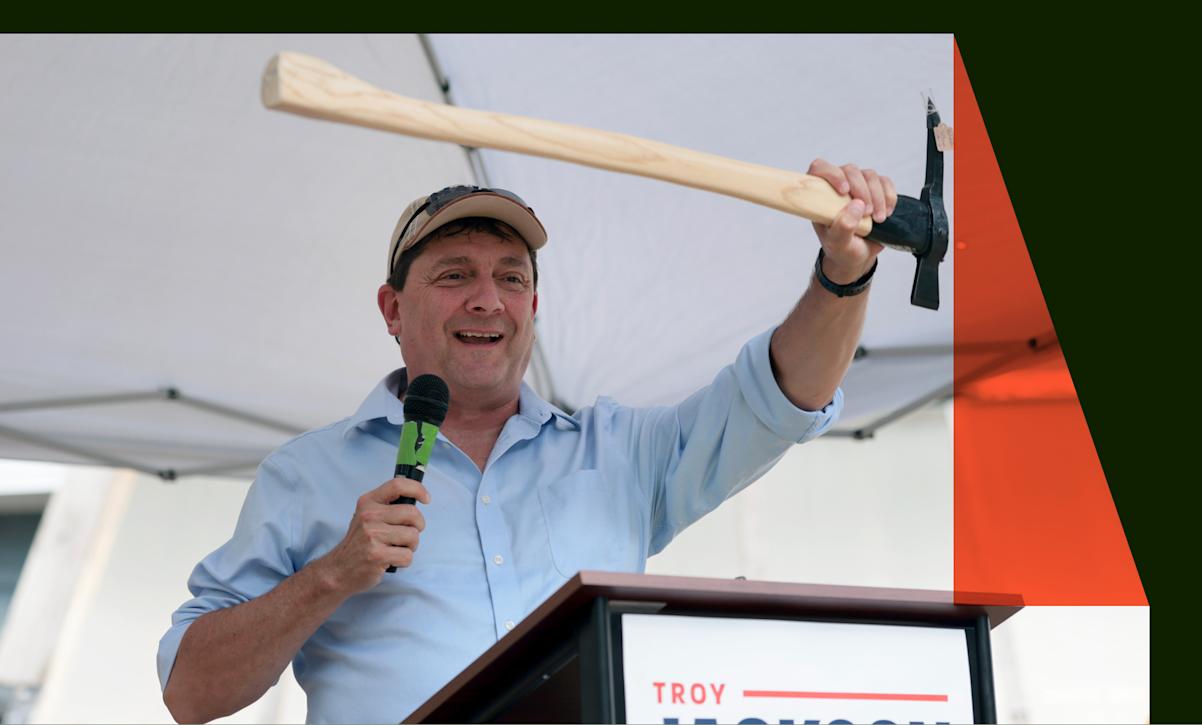Troy Jackson holds a pulaski axe given to him during a gathering after being selected by the Maine Democratic Party to be their choice as the U.S. Senate nominee to replace Graham Platner on the ballot in November on July 25, 2026, in Bangor, Maine.