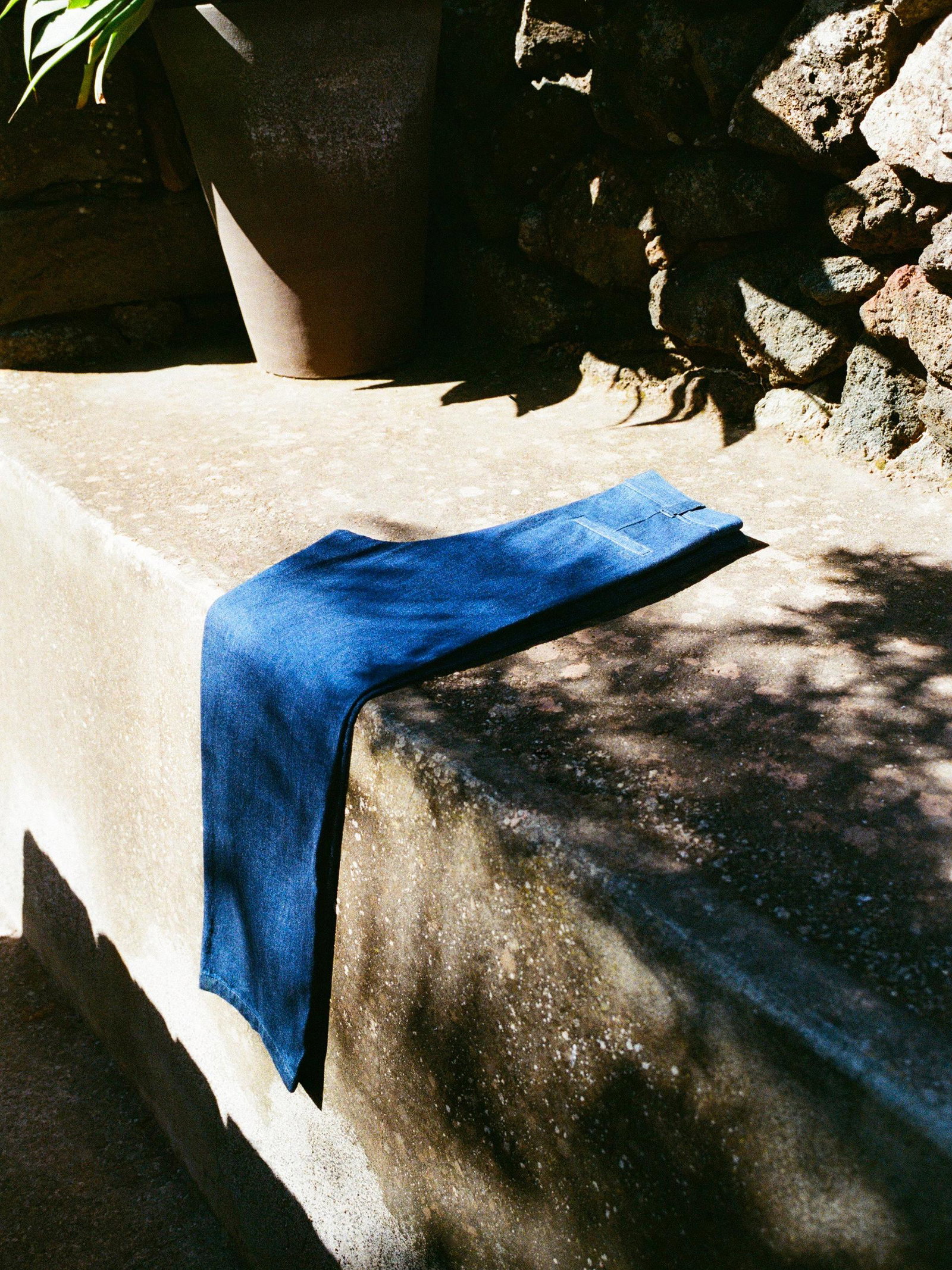 A.P.C.gif of light clothing in a summer setting