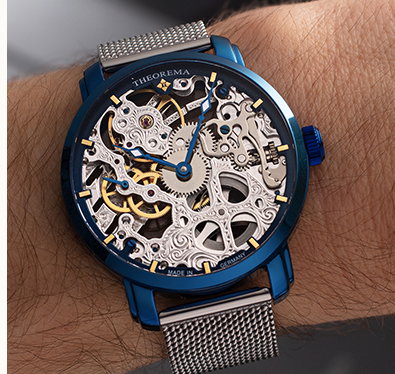 Silver metal band with blue case and silver dial