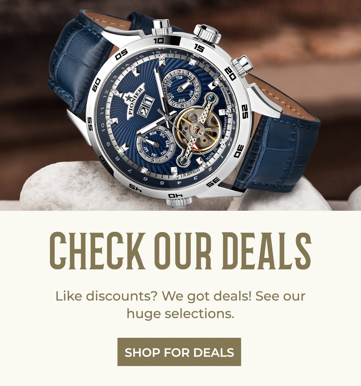 Blue dial watch with blue leather and silver case.