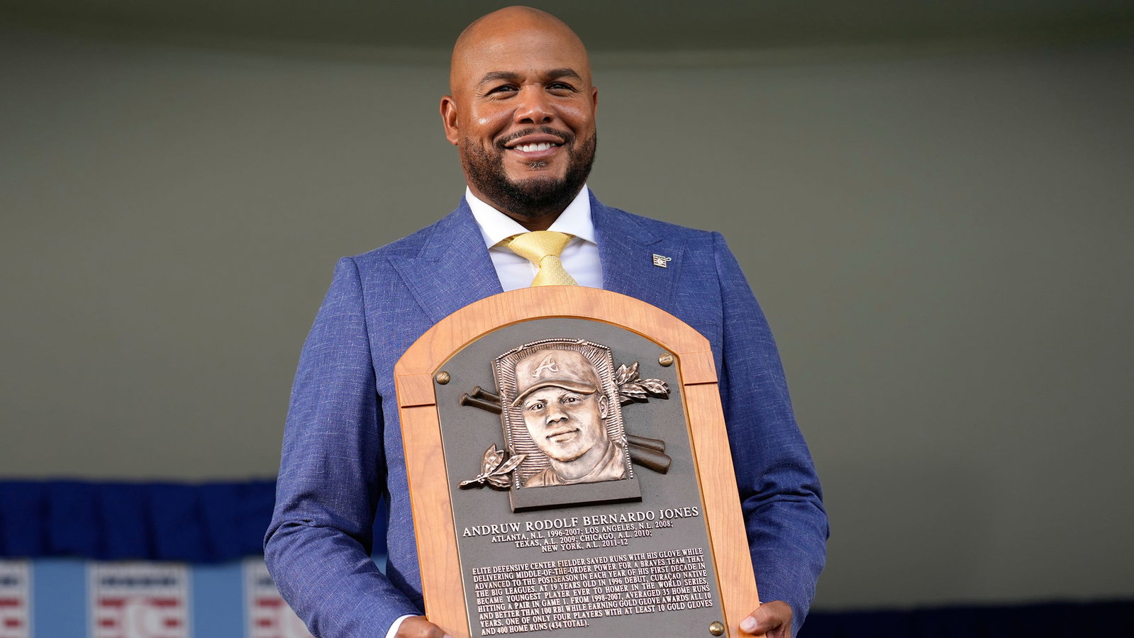 Andruw Jones holds his Hall of Fame plaque