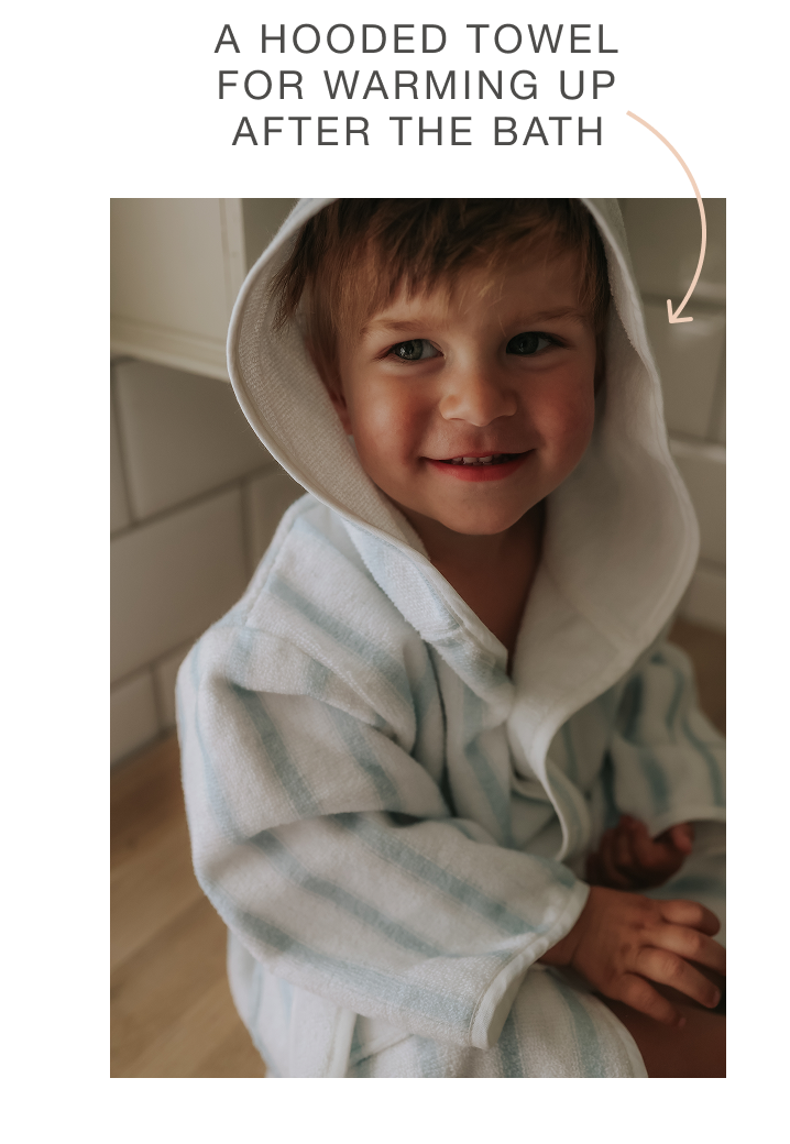 boy in hooded towel bath robe