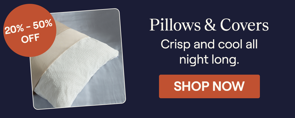 A pillow with a pillowcase and Performance Cotton Pillow Cover on it