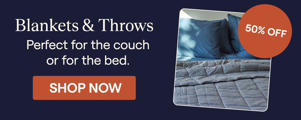 A pewter Textured Blanket on a bed
