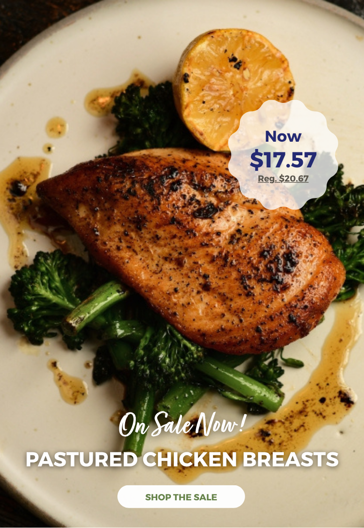 chicken breasts on a plate, chicken breast on sale