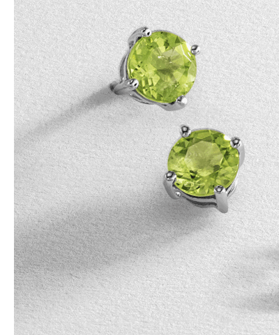 White gold green peridot gemstone stud earrings in four-prong setting.