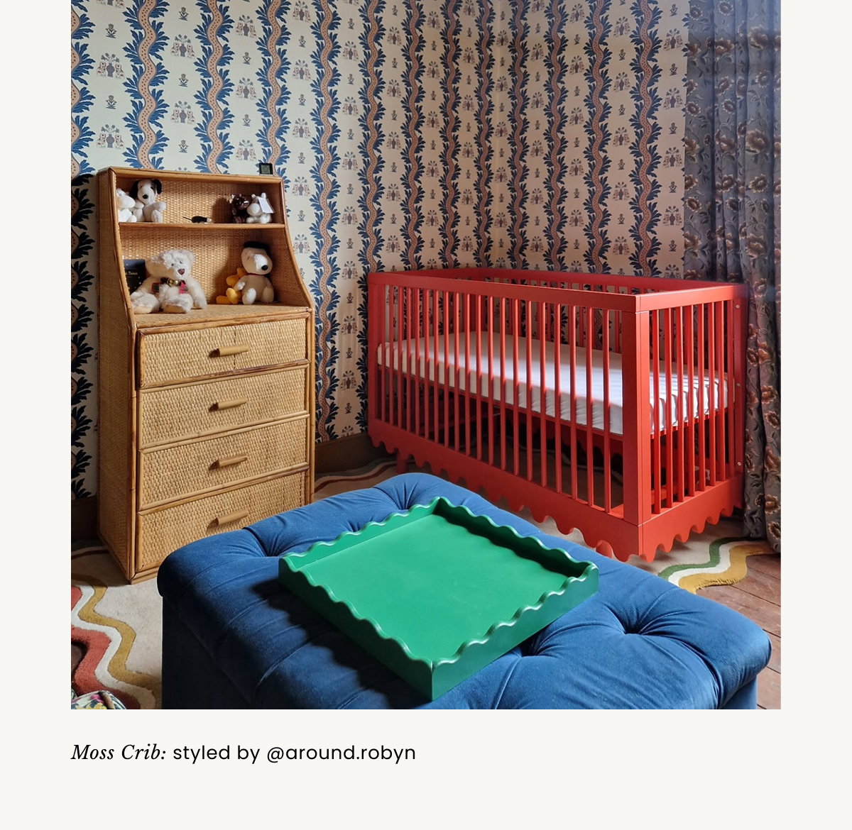 an image of a child's room with a crib and a rainbow