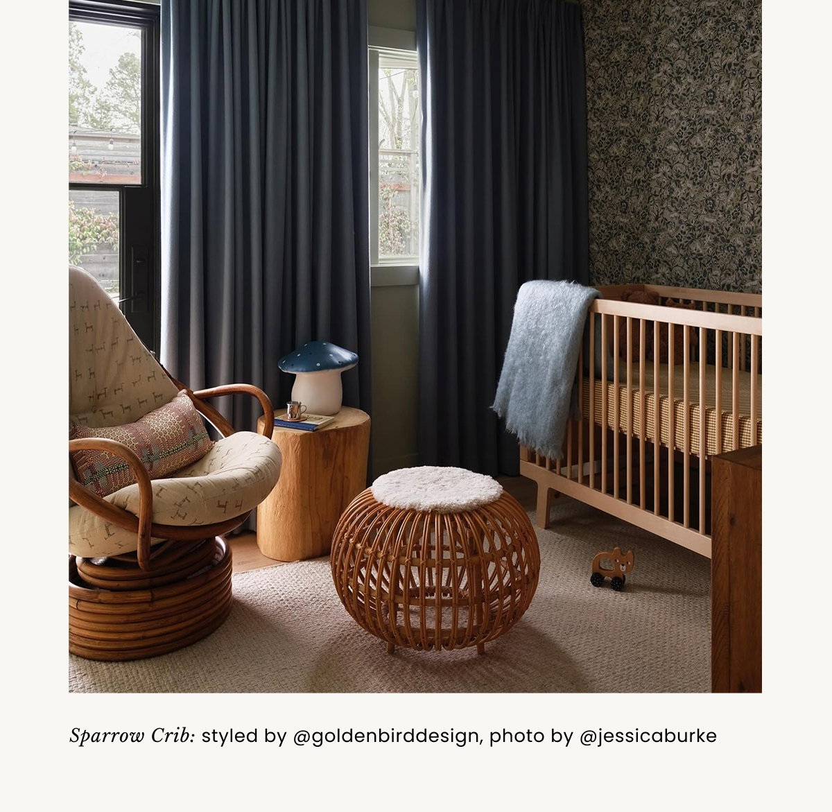 an image of a child's room with a crib and a rainbow