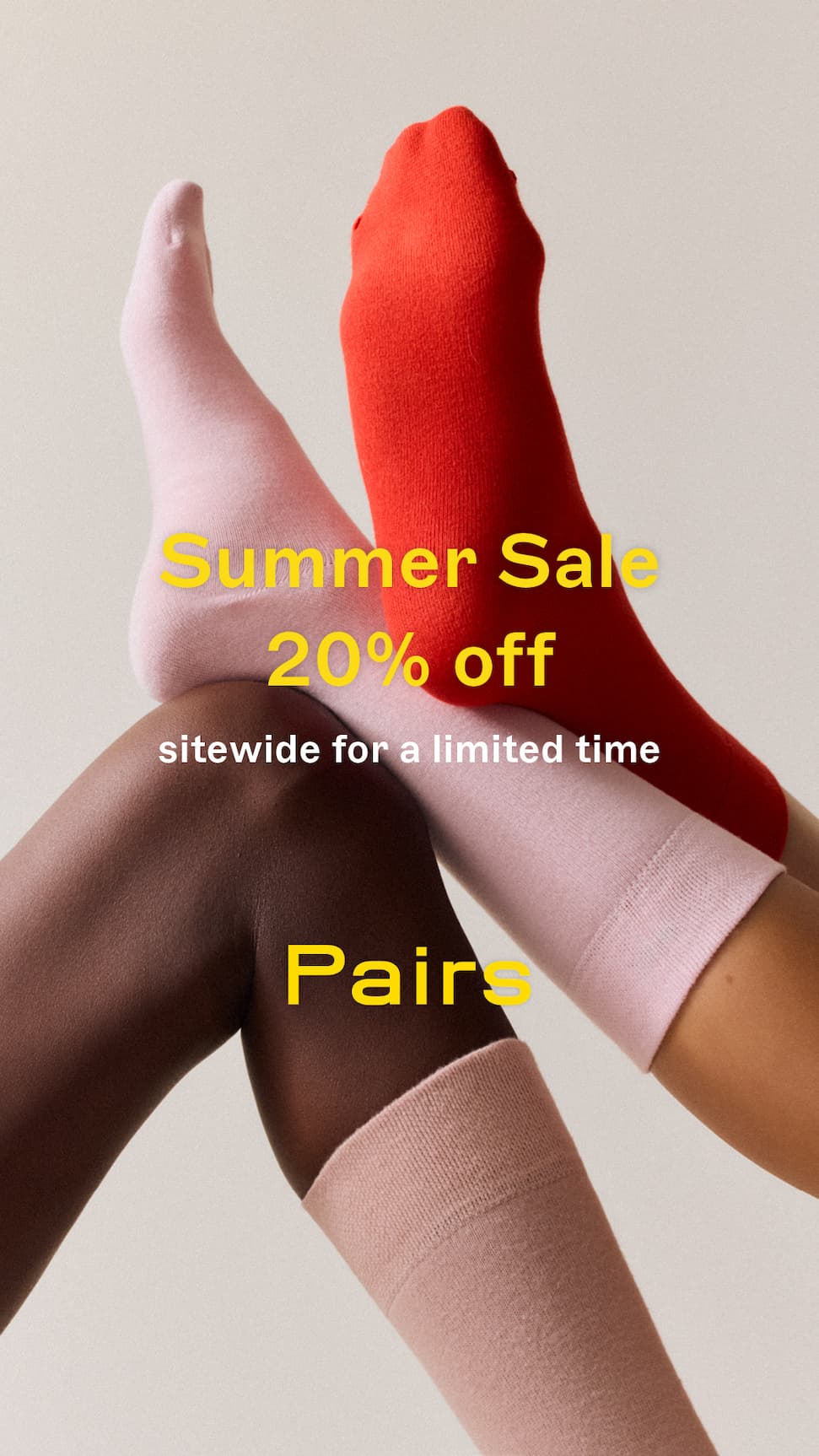 Three bamboo socks in pink and red on models with sale text overlay