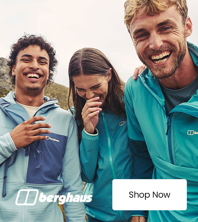 Three people wearing Berghaus outdoor jackets stand on a rocky hillside, with the Berghaus logo and a “Shop Now” call-to-action displayed in the image.