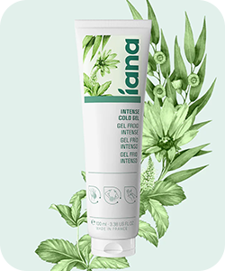 Tube of Iama Intense Cold Gel with mint and eucalyptus leaves, cooling skincare gel on pale green background