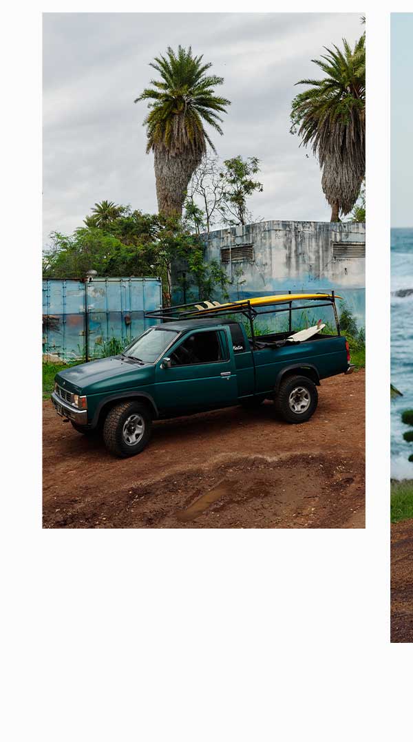 Truck with a surfboard on top