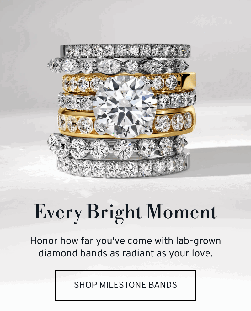 Stacked diamond bands with one engagement ring. Every Bright Moment. Honor how far you’ve come. Click to Shop Milestone Bands