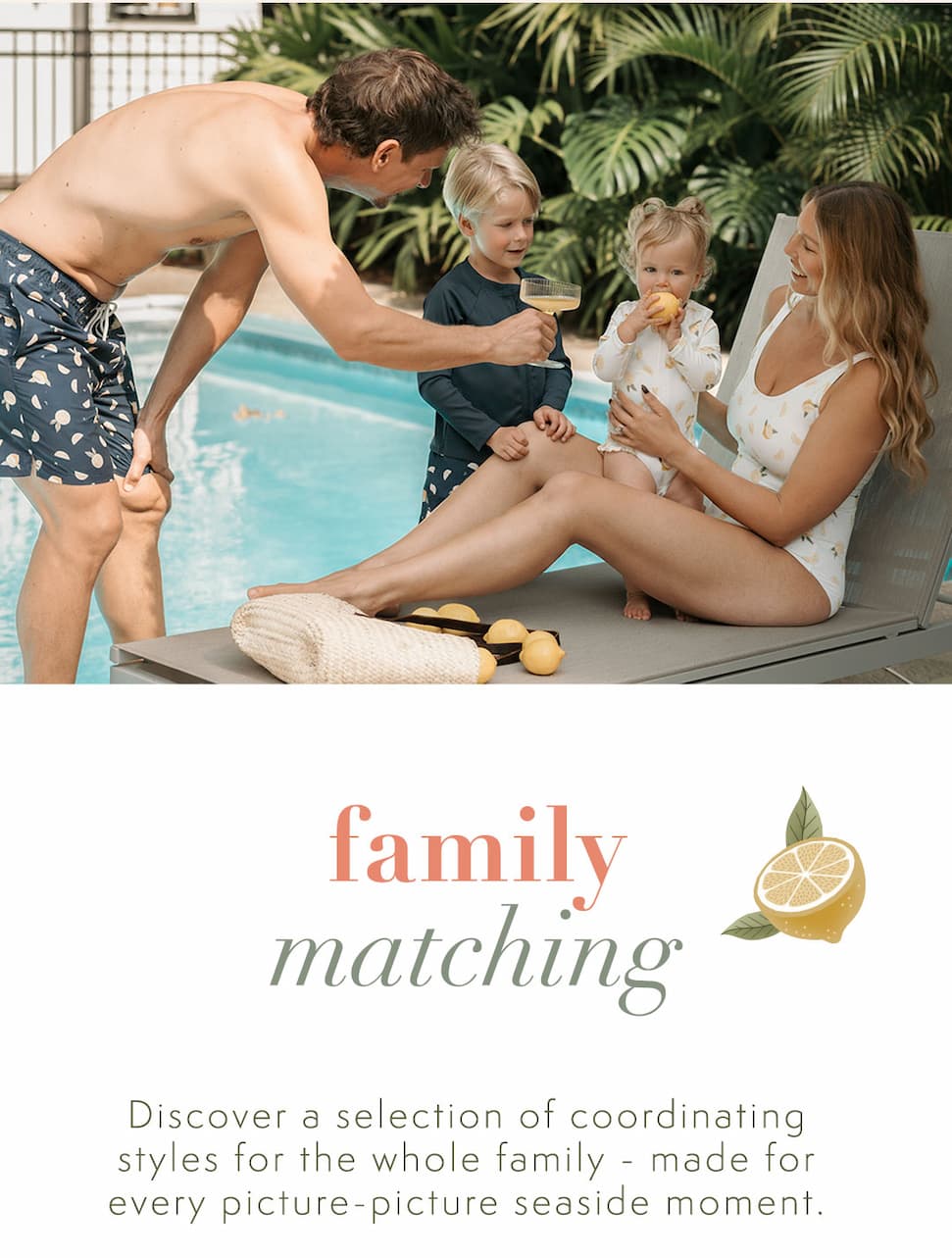 Discover family matching swimwear. Image shows a family by the poolside wearing matching white and navy blue swimwear with lemon print.