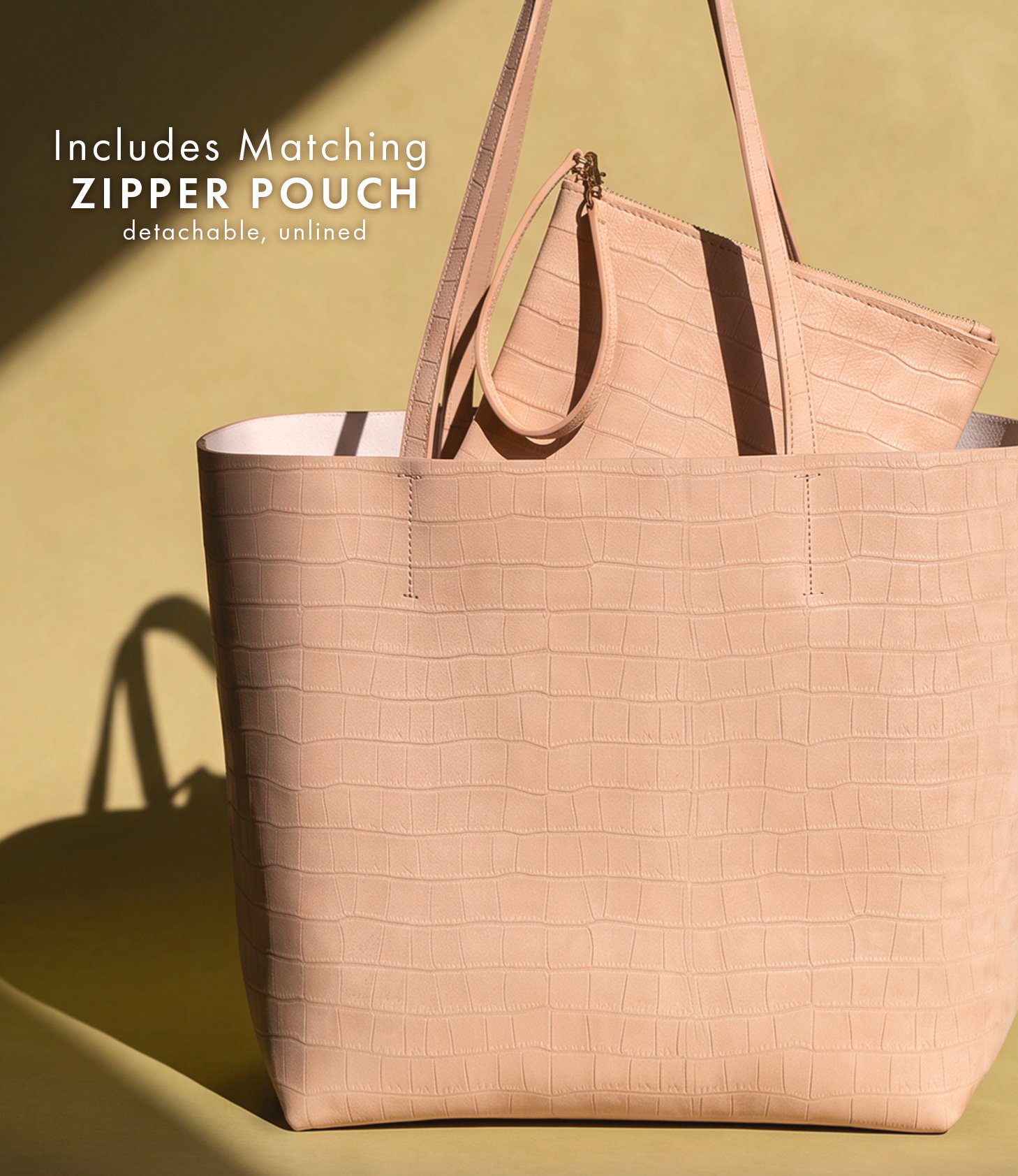 Includes matching detachable zipper pouch.
