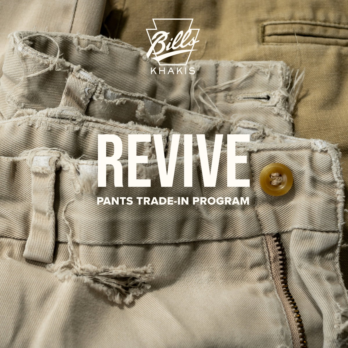 A close up shot of a pair of Bills Khakis showing tears and age. The Bills Khakis logo sits with a text overlay reads: REVIVE | Pants trade-in program 