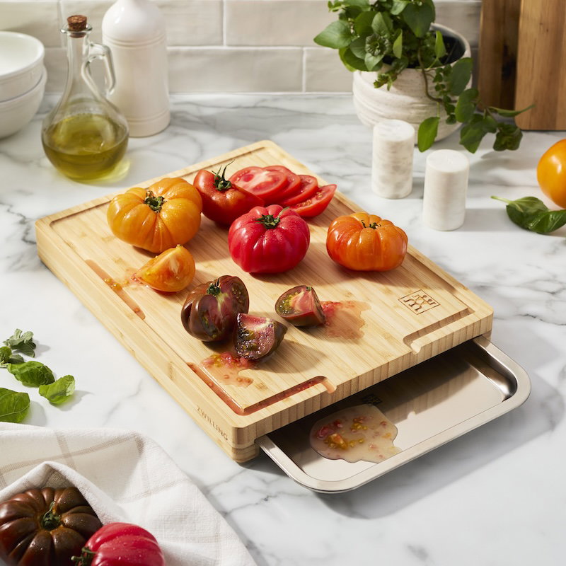 Cutting board with tray